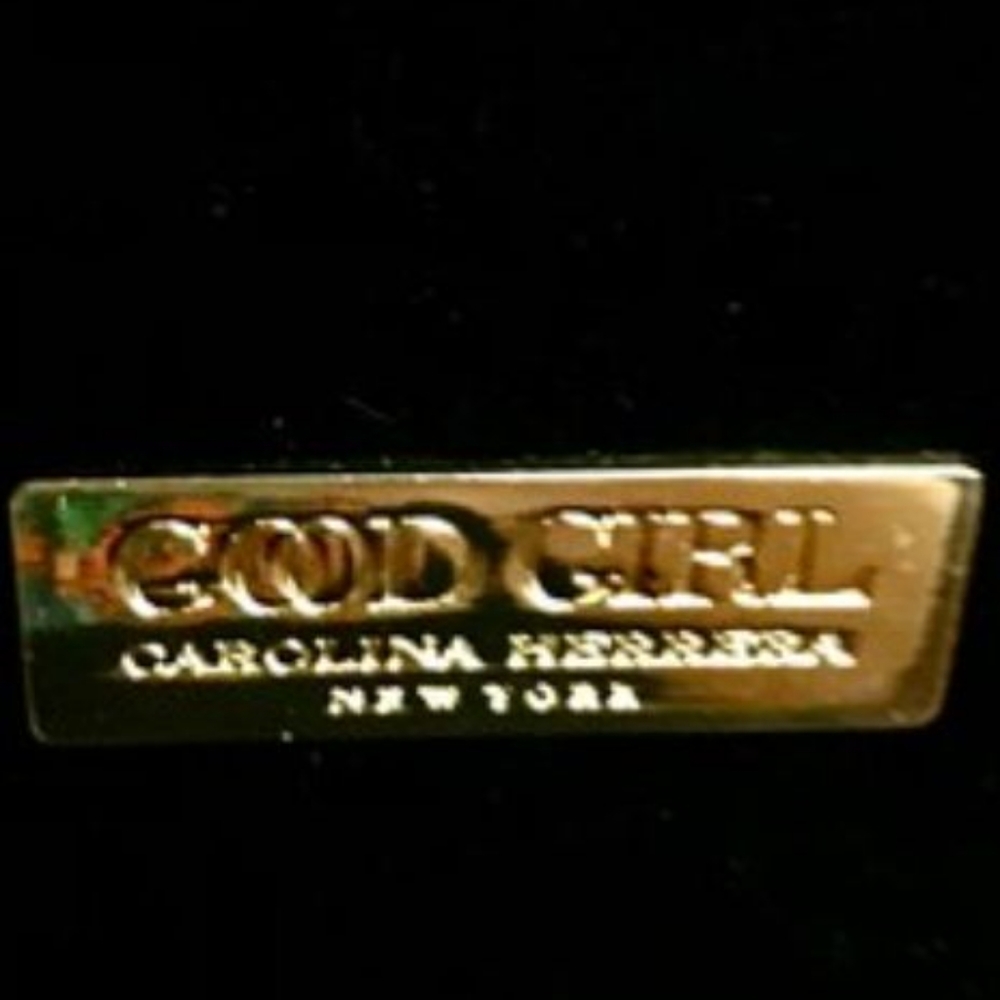 Gold Girl Carolina Herrera hand bag